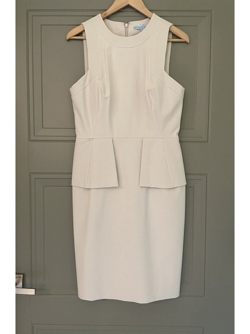 Flattering Sleeveless Sheath Peplum dress by Antonio Melani 8 Fully lined Tan